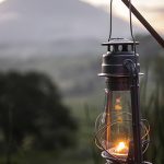 As the sun sets the lights come on and not just by electricity.