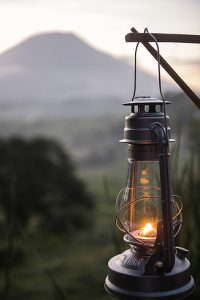 As the sun sets the lights come on and not just by electricity.
