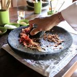 Grinding the spices